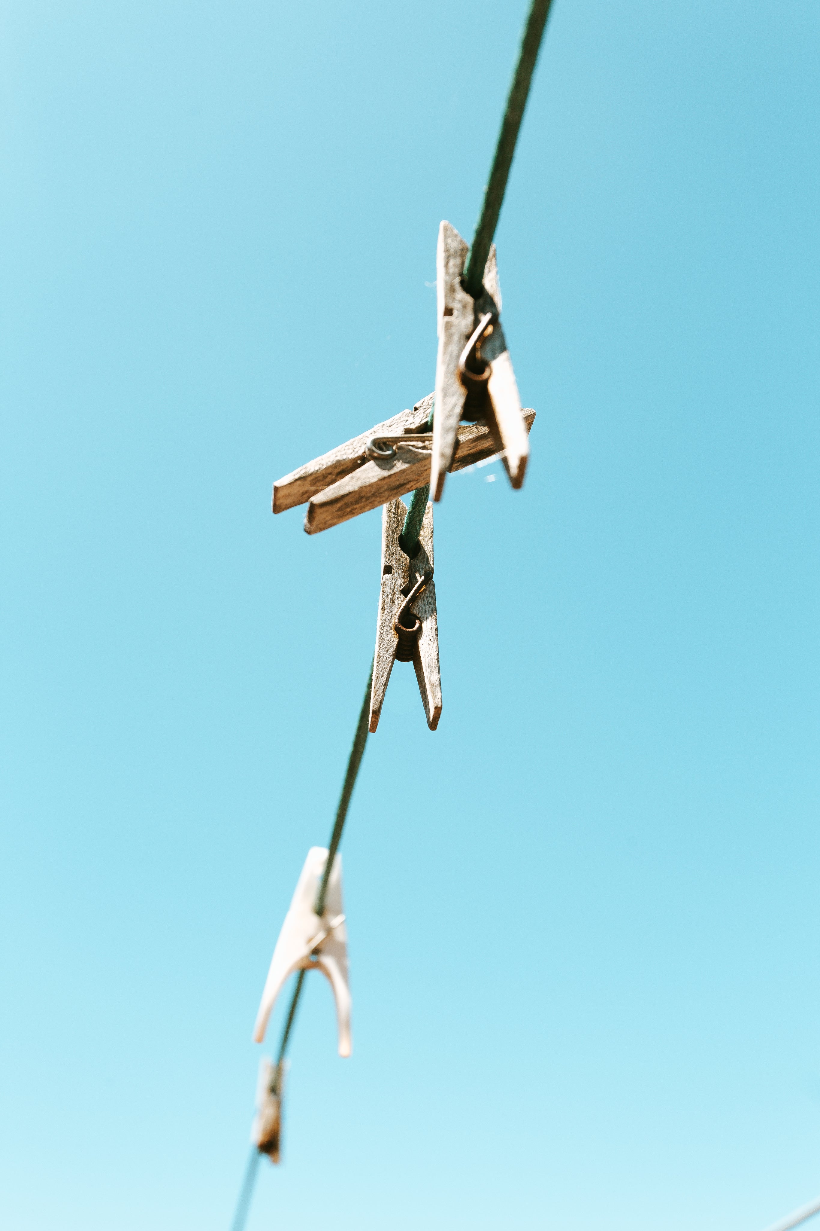 clothes-pins-against-a-bright-blue-sky.jpg